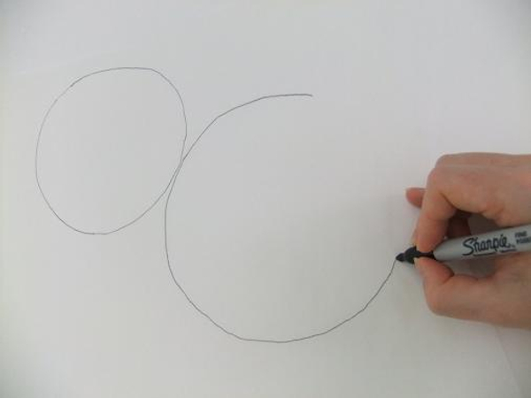 Draw two circles on wax paper