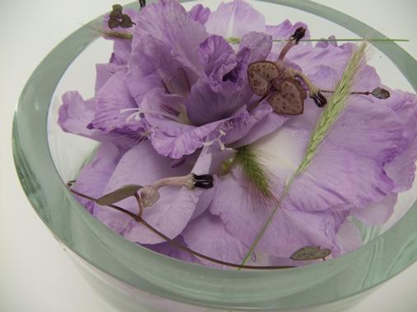 Fountain grass, rosary vine and gladiolus composite flower 