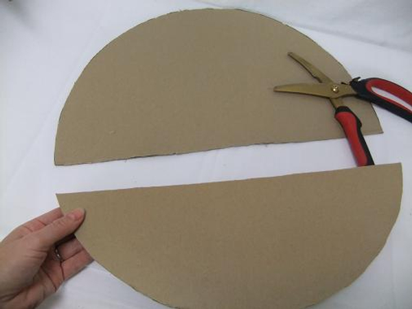 Cut the cardboard circle in half Cut the cardboard circle in half