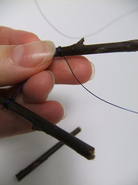 Move down the wire and wrap and twist another twig
