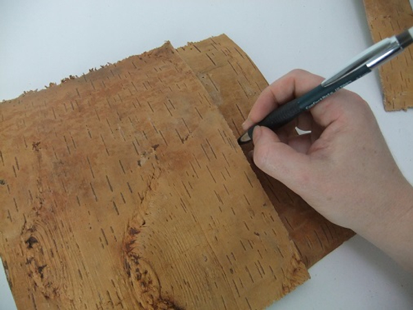 Mark a second sheet of bark to exactly match the first
