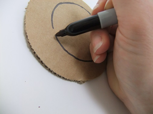 Cut a cardboard circle and draw another circle.jpg