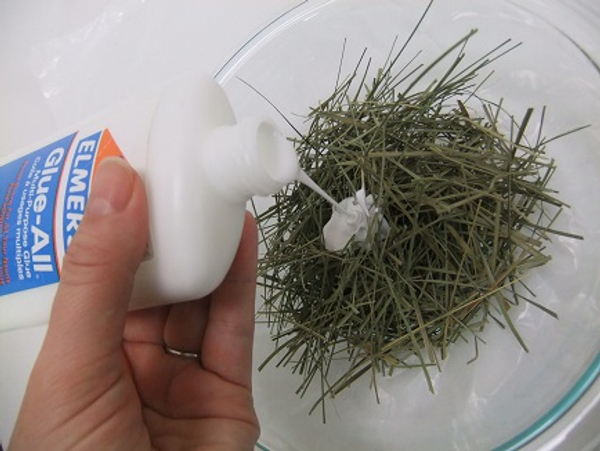 Pour a bit of wood glue over the strands Pour a bit of wood glue over the strands