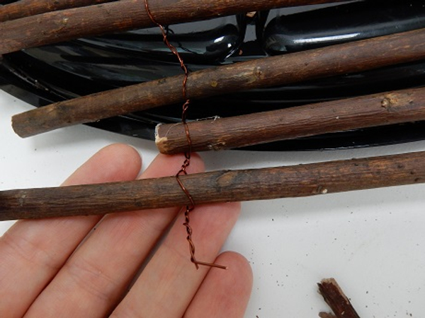Add one more twig to create a hook to hang the armature from