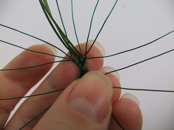 Fold the ripped foliage up to start the weaving pattern