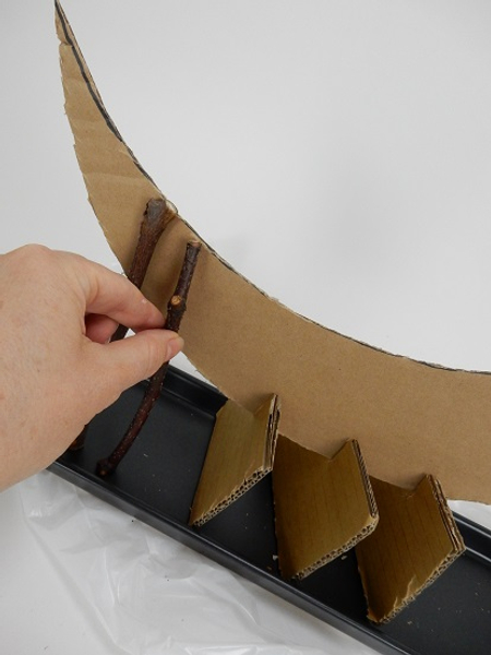 Measure the sticks against the cardboard and cut and glue.