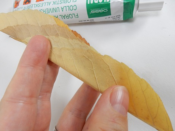 Add another leaf and secure with tiny drops of glue