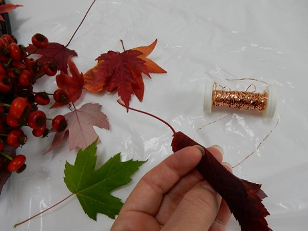 Roll an autumn leaf into a tube