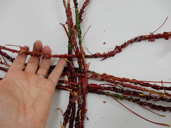 Start weaving in the long garland