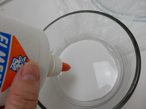 Pour out wood glue into a bowl