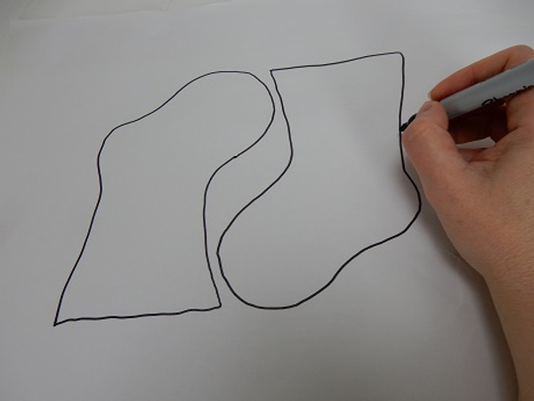 Draw a very basic Christmas stocking outline to use as a guiding template