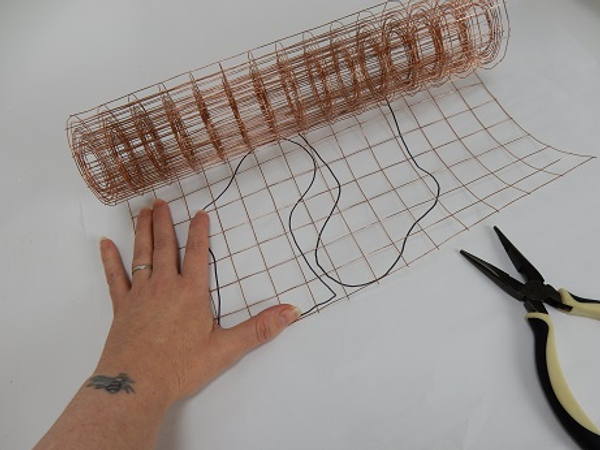 Measure out copper mesh to the size of the template.