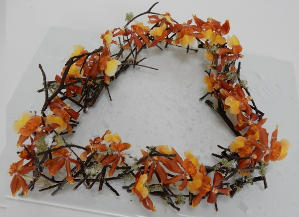 Stack twig heart, moss oncidium orchids and artificial snow