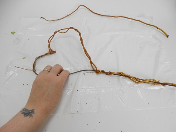 Adjust the tension in the twigs as you weave