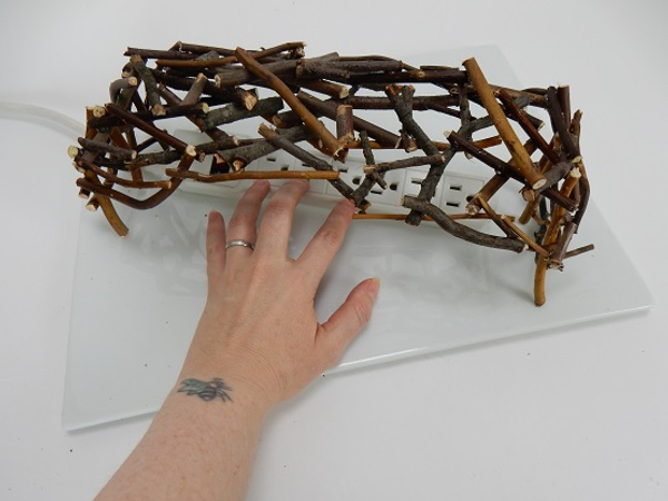 Place the twig shape over the power strip and finish your design with flowers Place the twig shape over the power strip and finish your design with flowers