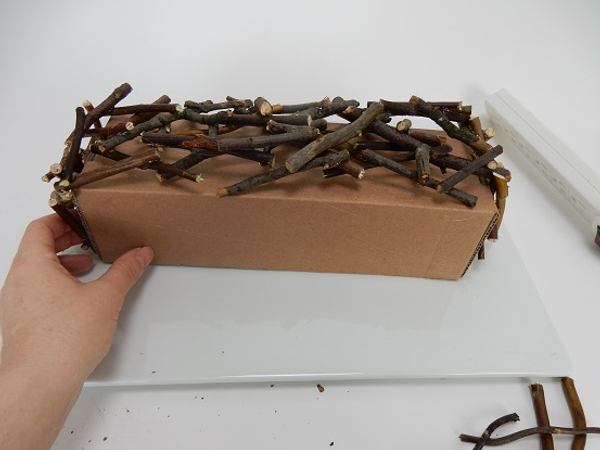 Test the shape by wiggling the twigs to make sure it is all connected Test the shape by wiggling the twigs to make sure it is all connected