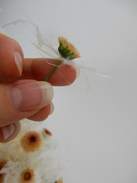 Make a fluffy collar for some of the taller, smaller flowers