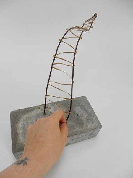 Secure the wire at the brick base with a twist Secure the wire at the brick base with a twist