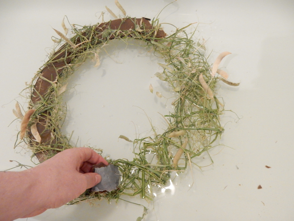 Move around the wreath and rip out the soggy cardboard Move around the wreath and rip out the soggy cardboard