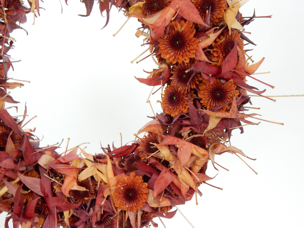 Rolled autumn leaf wreath