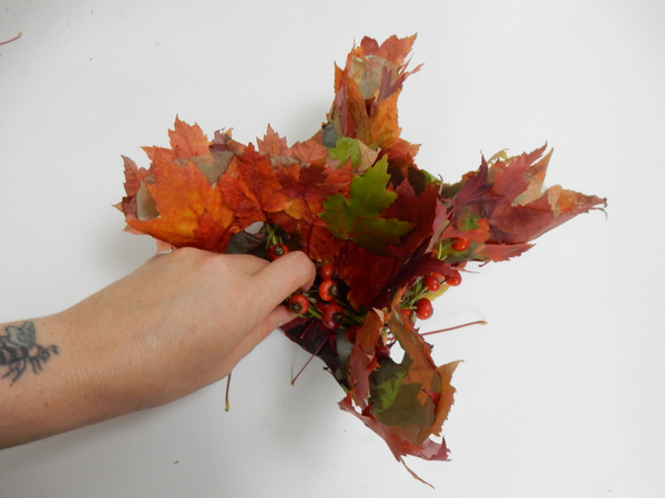 Weave in the shorter rosehip stems to add more hips Weave in the shorter rosehip stems to add more hips