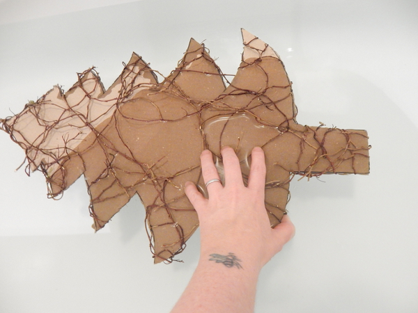 Let the cardboard soak up the water to become soggy
