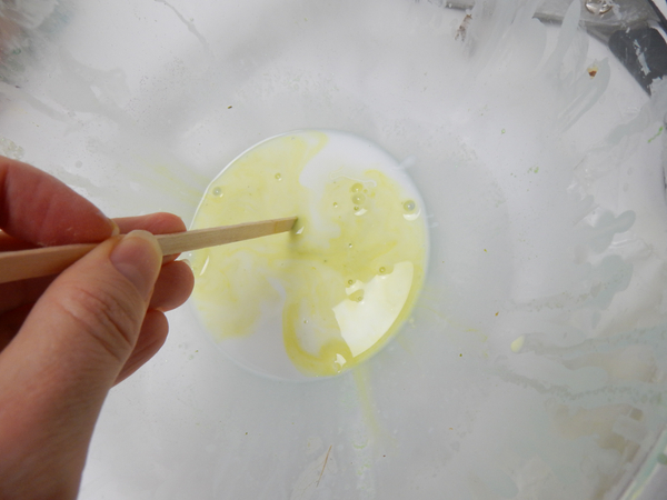 Mix a few drops of paint into wood glue