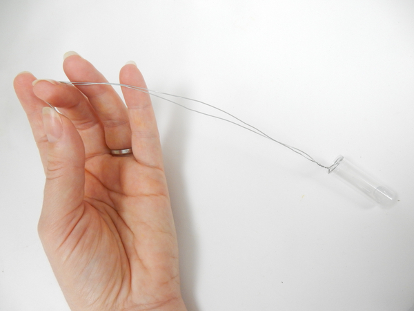 Bend the wire ends to loop around your finger