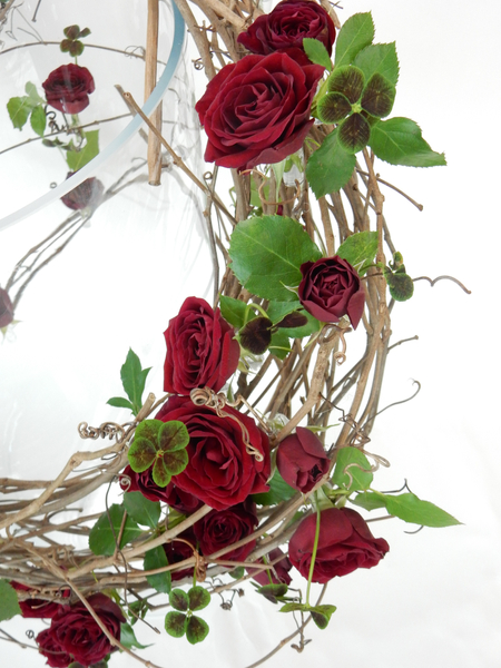 Grape vine, rose and clover armature design