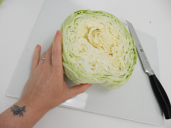 Slice a chunk away from the cabbage