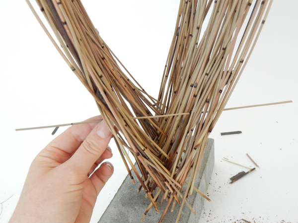Simply spear the reeds through the armature