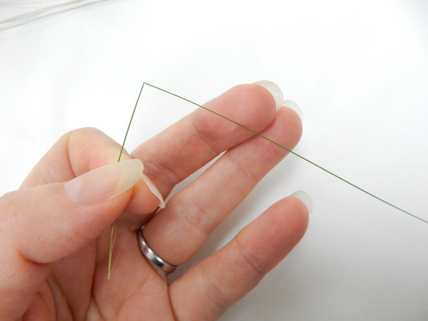 Bend the grass at a sharp angle without breaking it