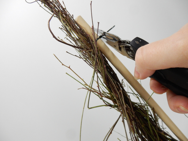 Cut away the long end of the cable tie