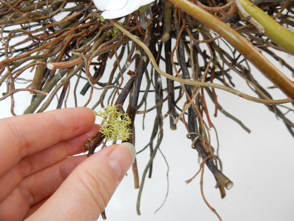 Add tiny bits of moss.