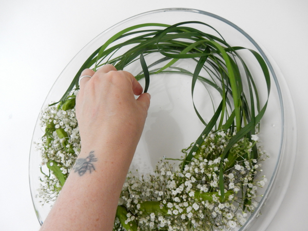 Curl, curve and drape some lily grass to complete the shape