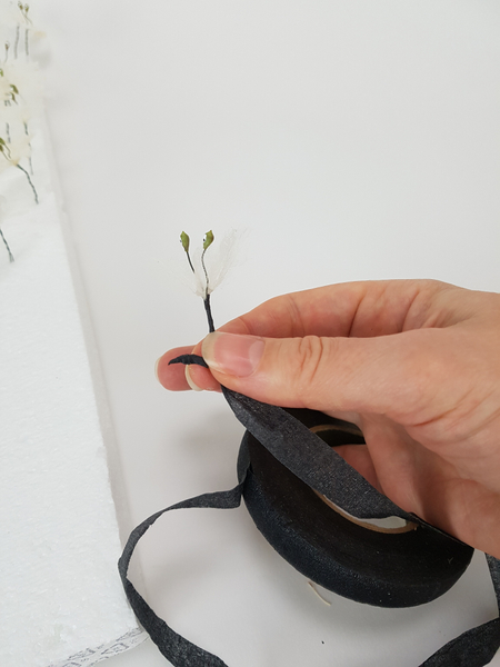 Wrap the wire in florist tape