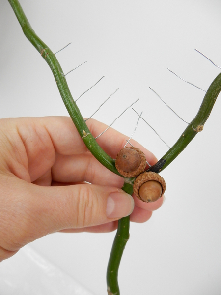 Glue in the acorns to build up the armature