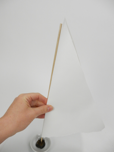Fold a piece of paper in half and measure it against the dowel
