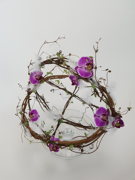 Phalaenopsis and rosary vine spring feather wide gap basket design