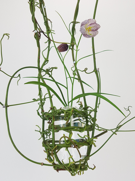 Clematis vine and Fritillaria flowers nest swing