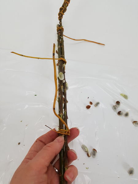 Secure the stems with a willow knot
