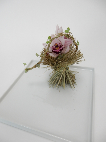 Cymbidium, Ceropegia woodii and  Phormium floral design