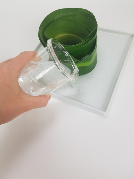 Pour water into the container