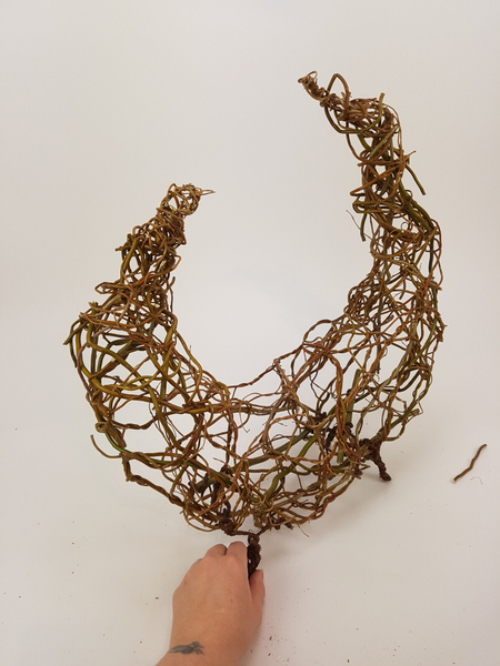 And wrap it around the willow stems in the armature to secure