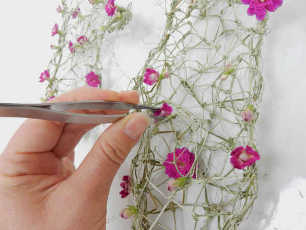 Glue the floral details into the design