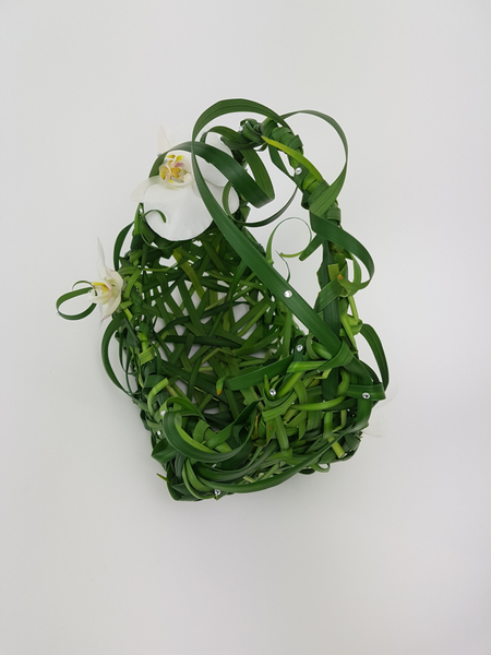 Weave a sturdy basket from grass floral design