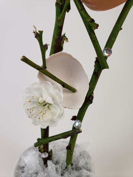 Blossom and eggshell floral design