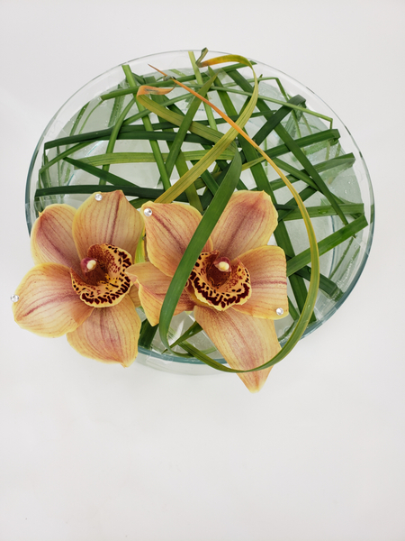 Cymbidium and lily grass flower arrangement