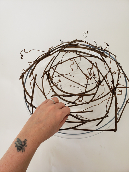 Continue to add twigs to create a full rose shape
