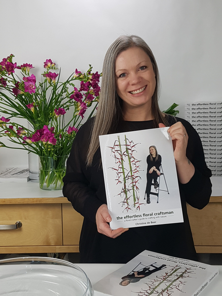 Christine de Beer with her book the Effortless floral craftsman